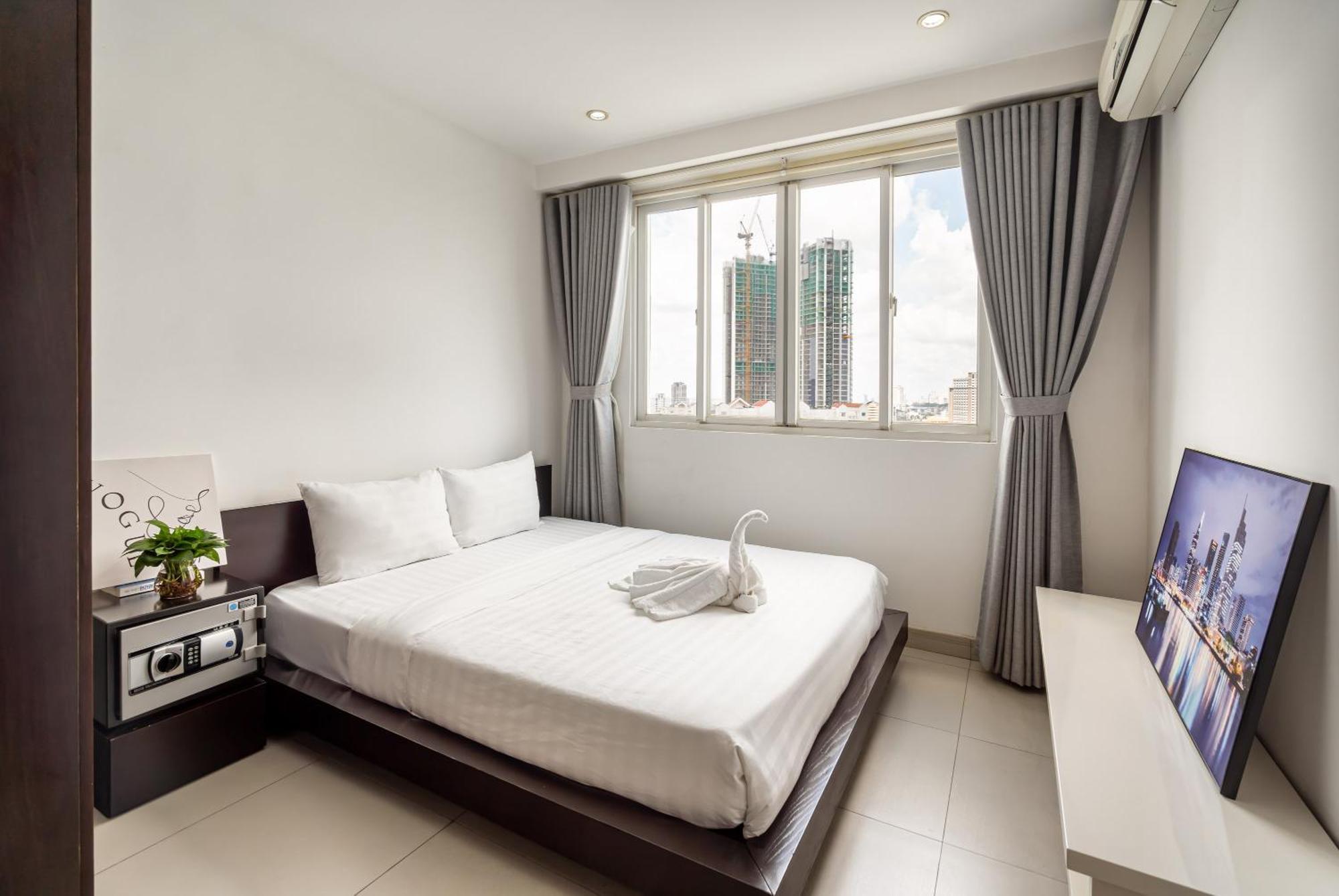 Căn hộ Otis Apartment - Balcony View - Steps From Bui Vien - International Plaza Building - District 1
